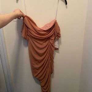 Mauve dress. Size 8 but a small 8. Not true to size. New with tags.